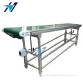 Adjustable height slope conveyor